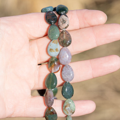Perles gouttes lisses en Agate indienne de 13/14 mm ( 1/2 rang de env 14 perles )