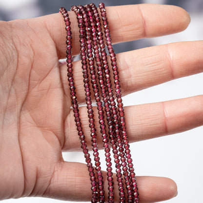 Perles rondelles facettes de Grenat almandin de 2,7 x 2 mm ( rang de env 180 perles )