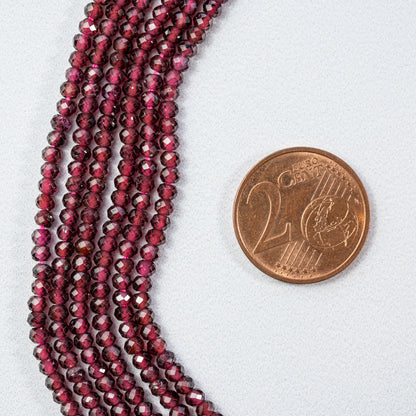 Perles rondelles facettes de Grenat almandin de 2,7 x 2 mm ( rang de env 180 perles )