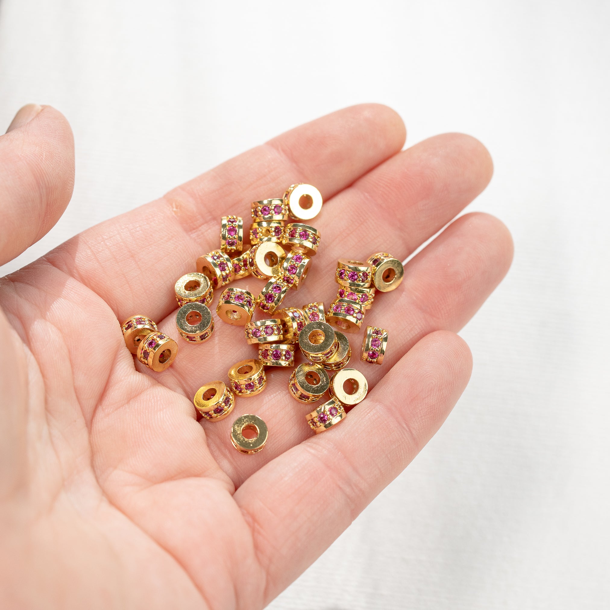 Perles rondelles en laiton plaqué or 18k et zirconium rose fuchsia de 6 x 3,5 mm ( à l&