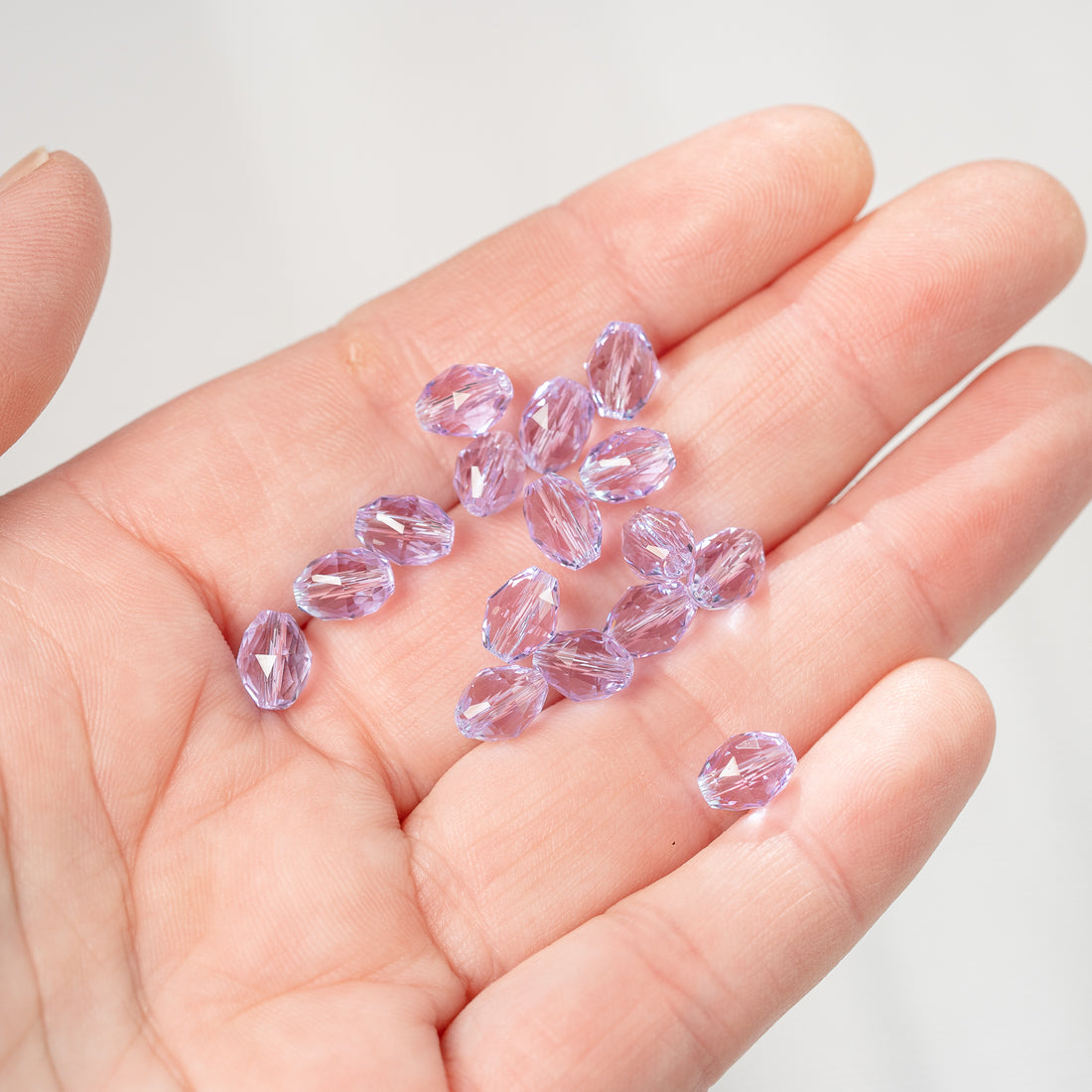 Perles ovales facettes en verre K9 lilas de 8 x 6 mm ( lot de 2 )