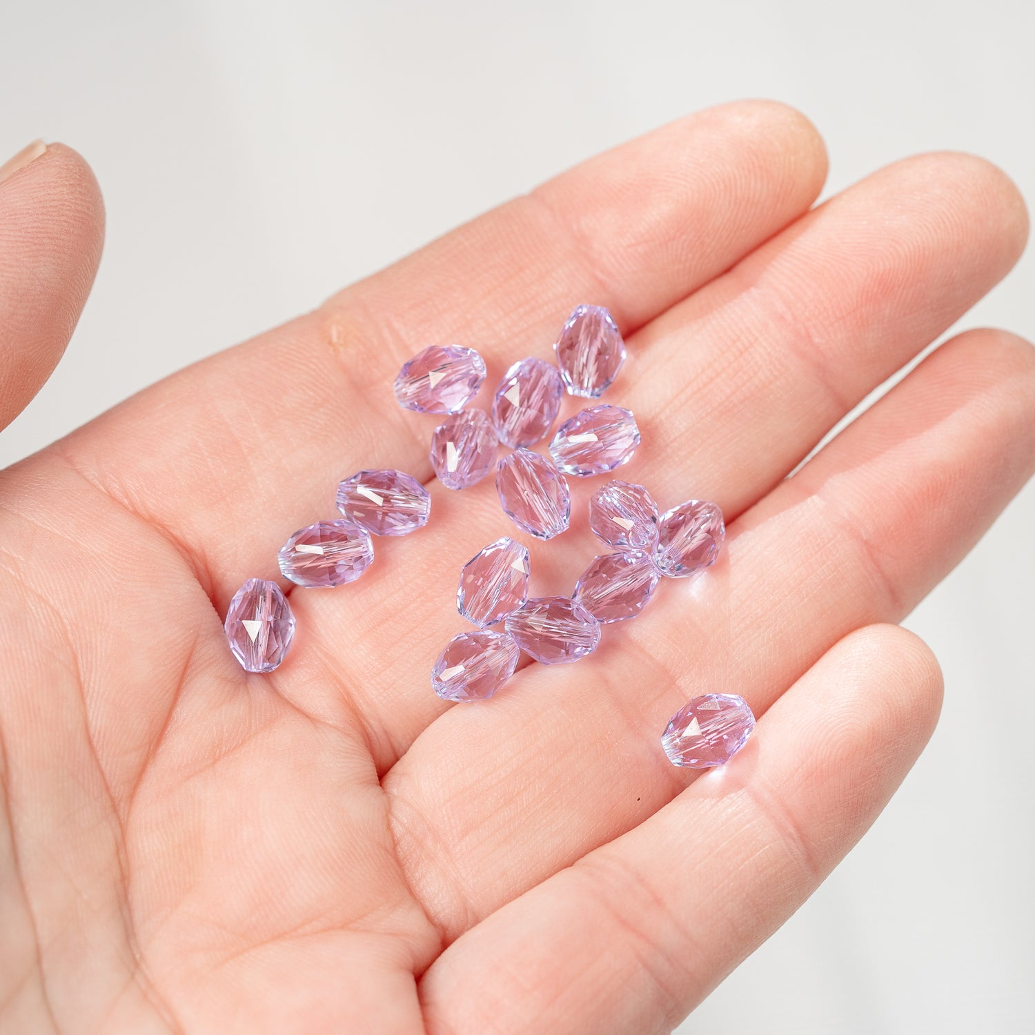Perles ovales facettes en verre K9 lilas de 8 x 6 mm ( lot de 2 )
