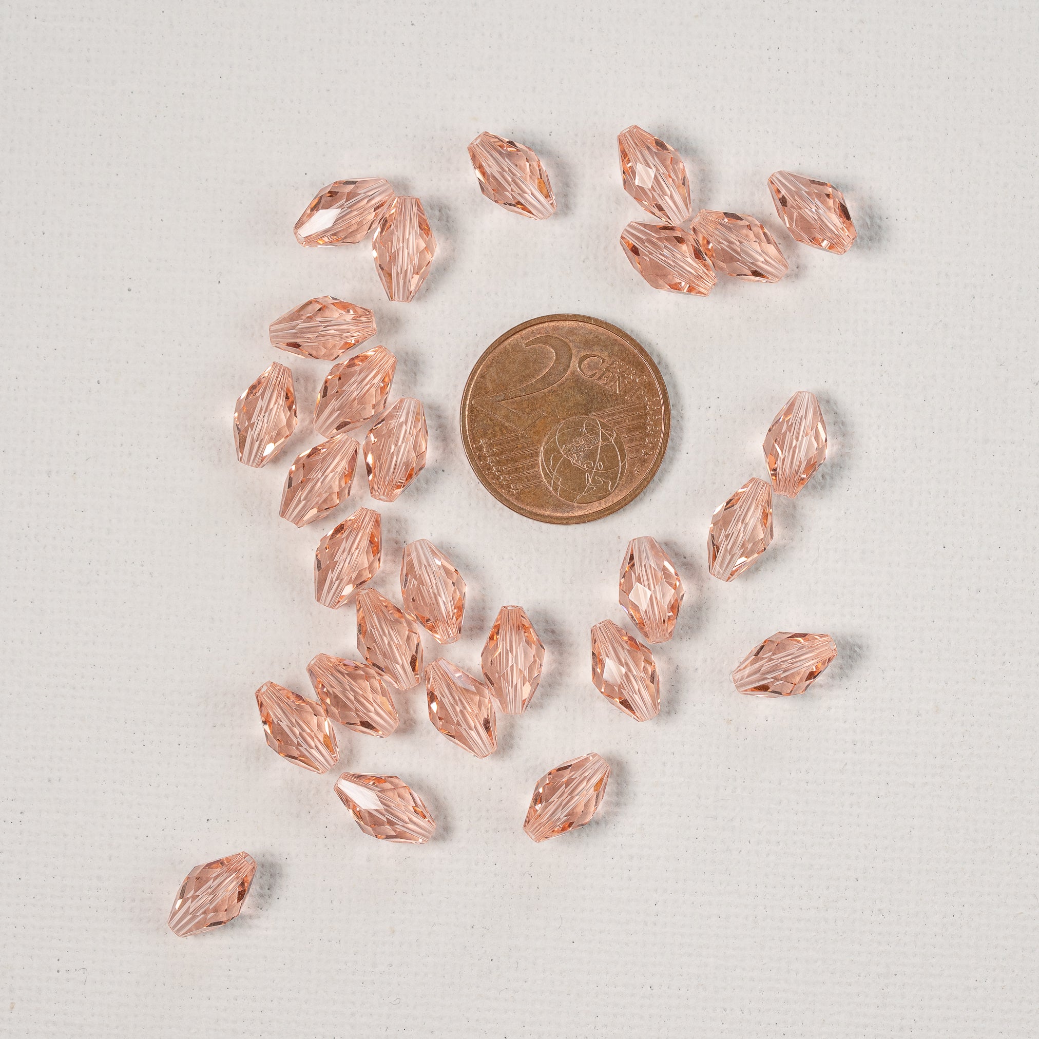 Perles ovales facettes en verre K9 rose saumon de 9,5 x 5,5 mm ( lot de 2 )