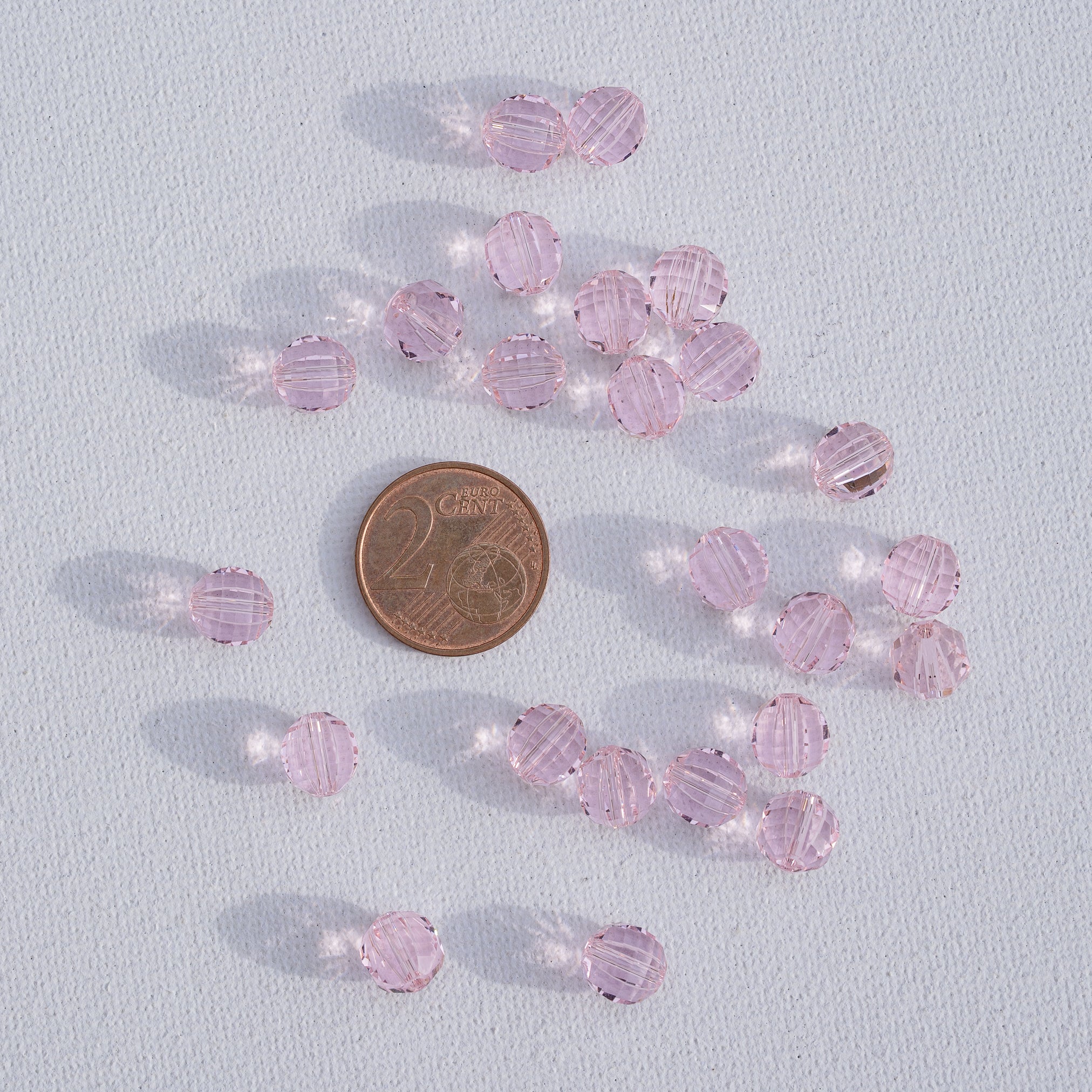 Perles rondes facettes en verre K9 rose de 7,5 mm ( lot de 2 )