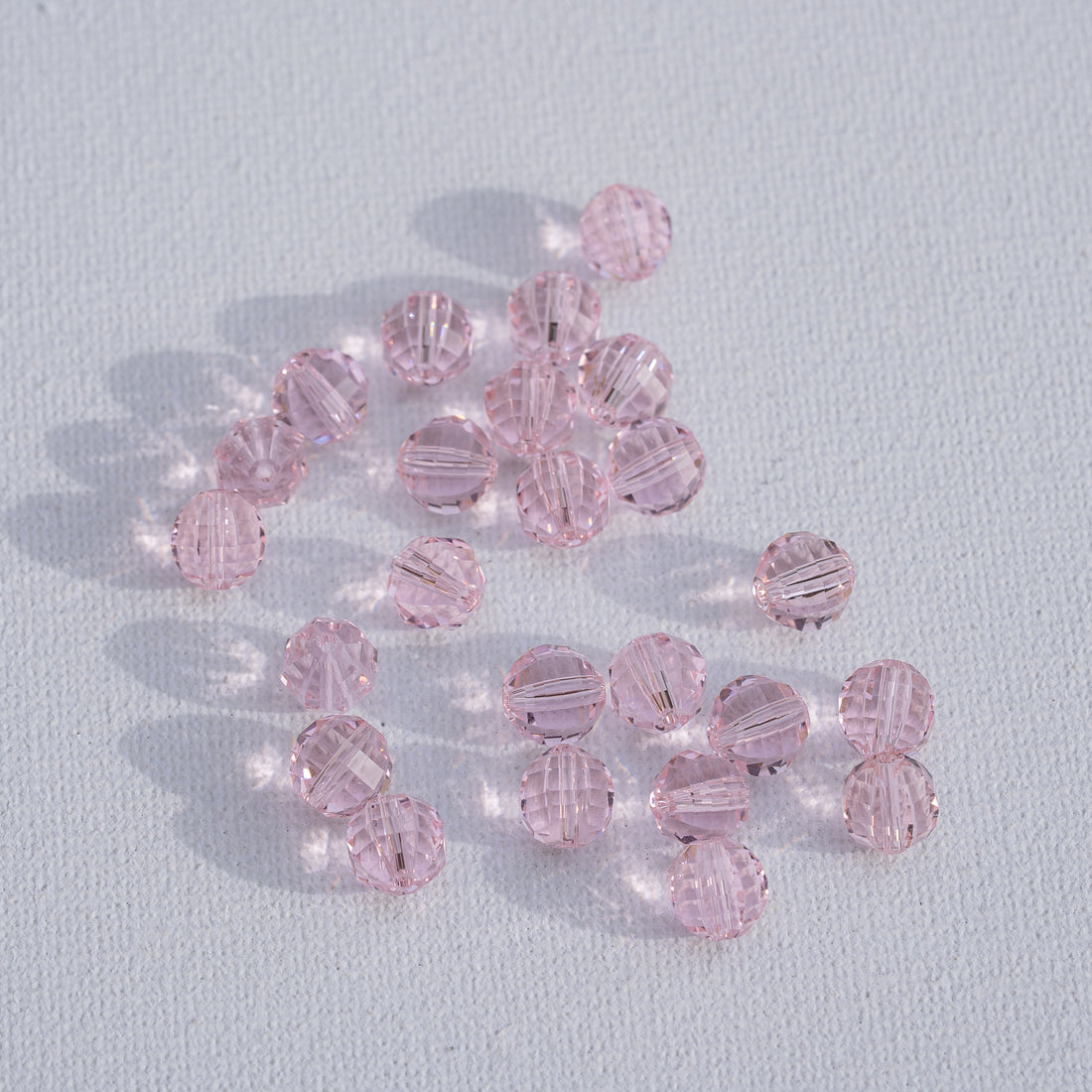 Perles rondes facettes en verre K9 rose de 7,5 mm ( lot de 2 )