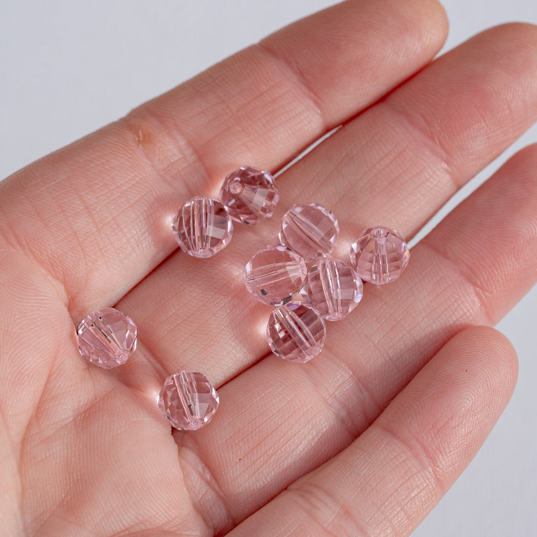 Perles rondes facettes en verre K9 rose de 7,5 mm ( lot de 2 )