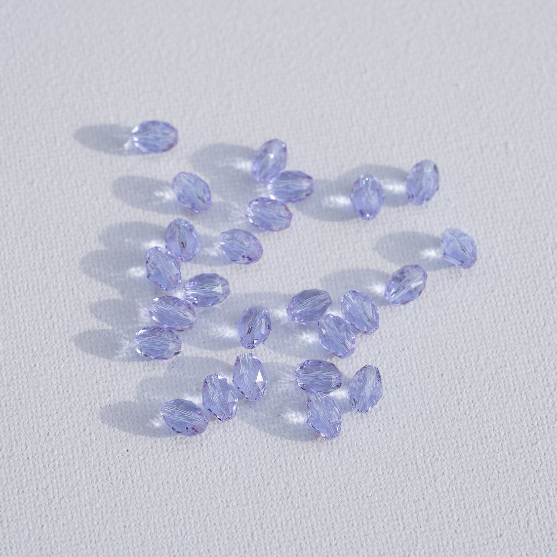 Perles ovales facettes en verre K9 lilas de 8 x 6 mm ( lot de 2 )