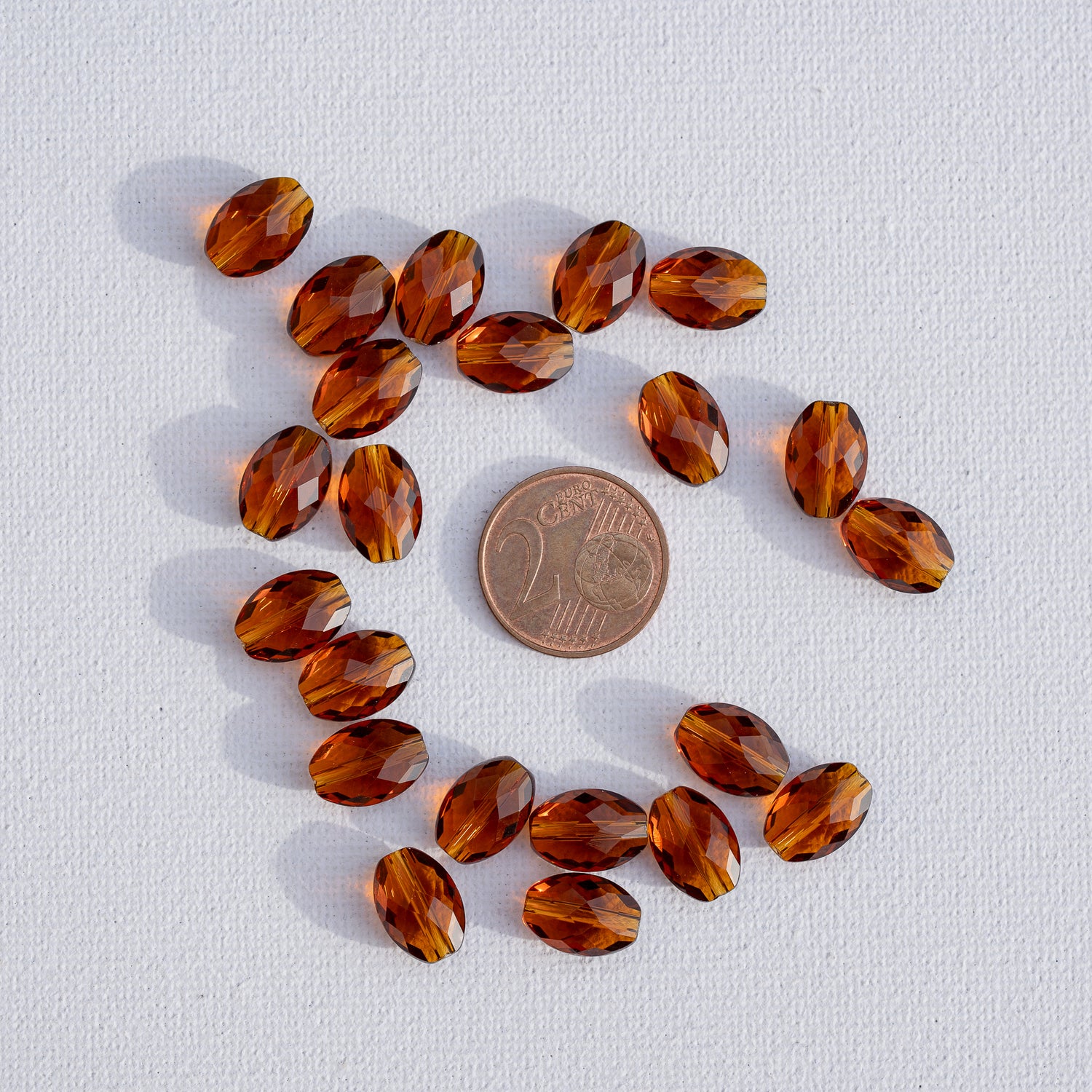 Perles ovales facettes en verre K9 cognac de 11,5 x 6 mm ( lot de 2 )
