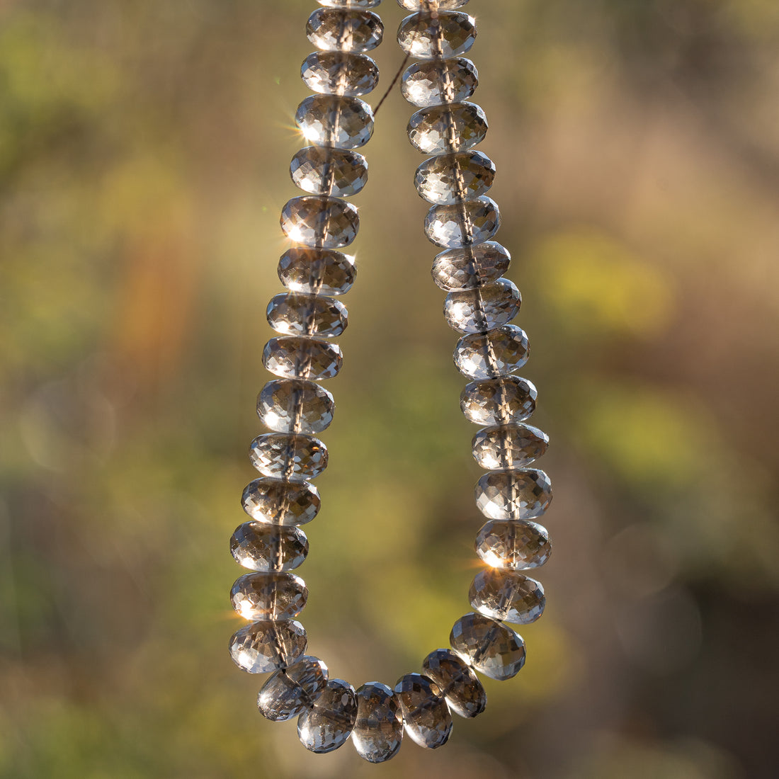 Fil de env 20 cm de perles rondelles facettes de quartz fumé de env 7,5 ou 9,5 mm