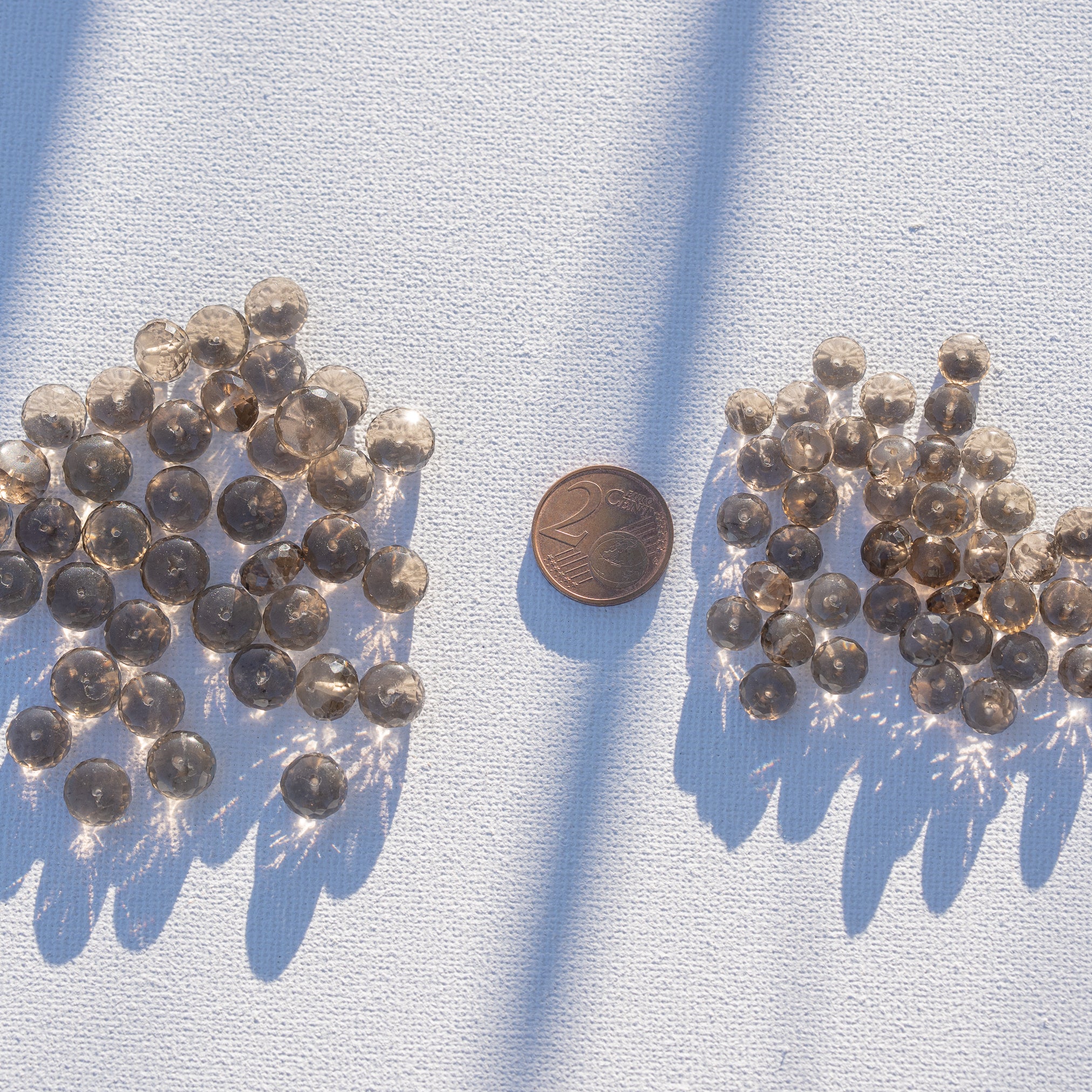 Perles rondelles facettes de quartz fumé de env 7 ou 9 mm ( lot de 2 perles )