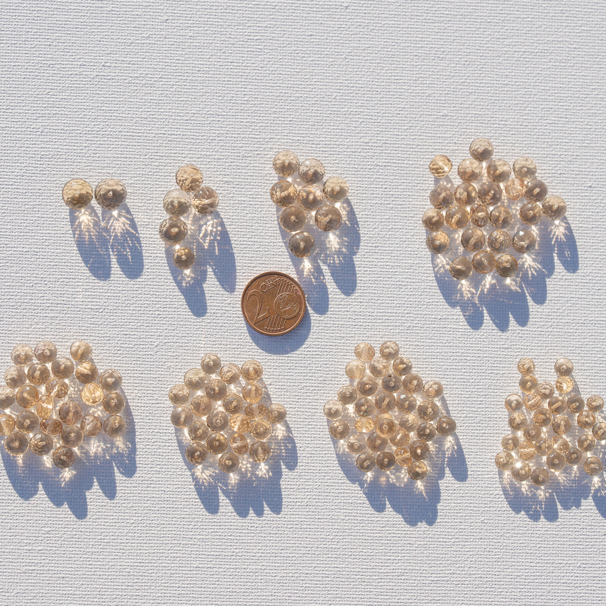 Perles rondelles facettes de Citrine naturelle de env 5,5 à 9 mm ( lot de 2 perles )