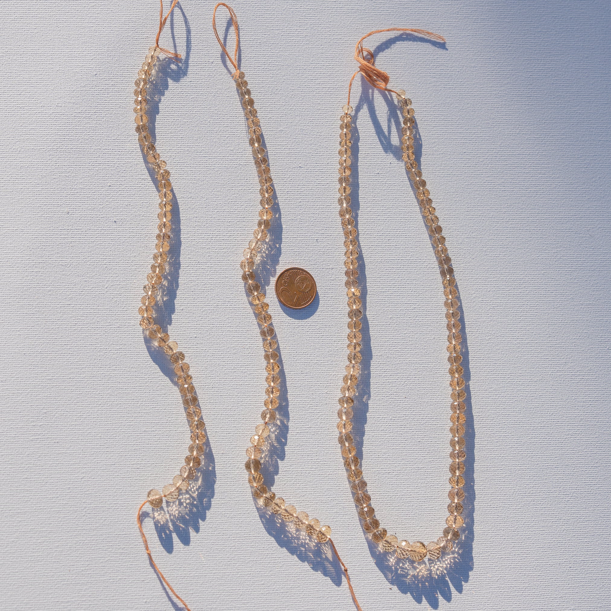 Fils de 22 ou 43 cm de perles rondelles facettes de Citrine naturelle de env 5 à 9 mm