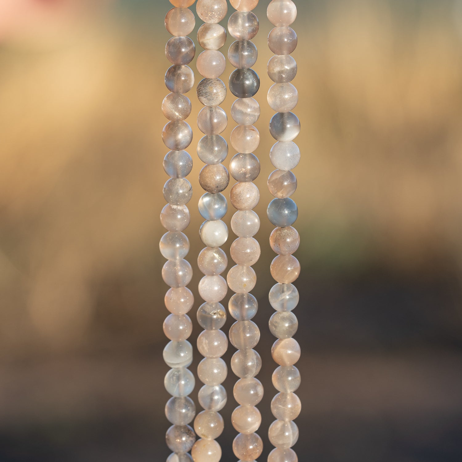 Perles rondes lisses de Pierre de lune grise de 5,7 mm ( 1/2 rang de env 33 perles )