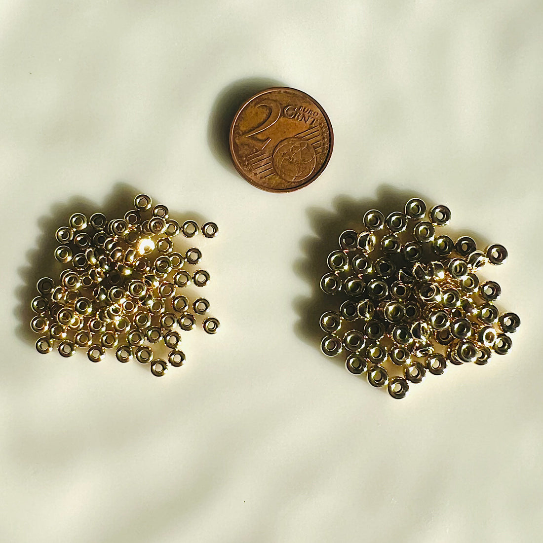 Perles rondelles lisses en gold filled 14k de 3 ou 4 mm ( en lot )