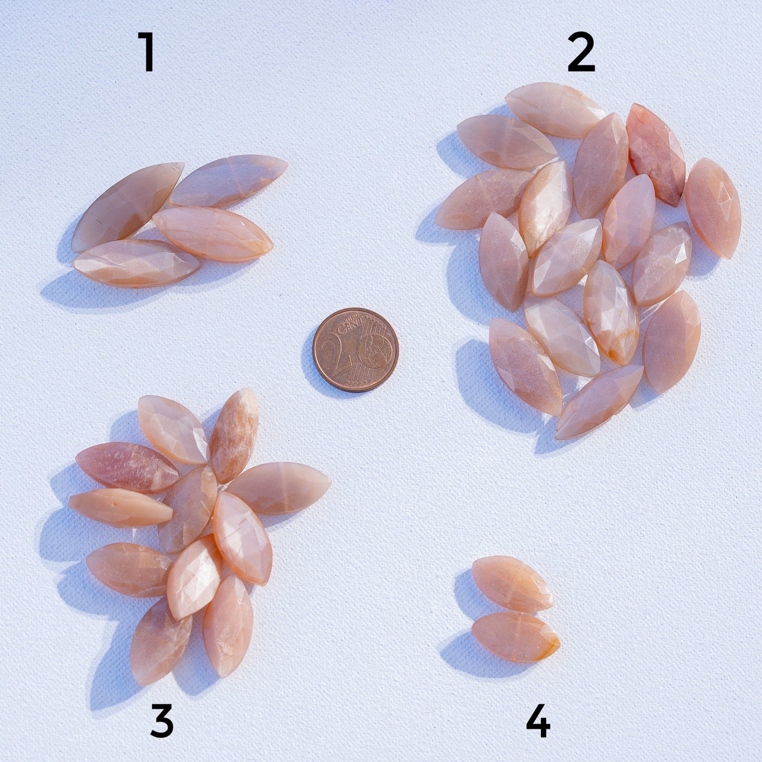 Perles ovoïdes facettes en Pierre de lune rose de env 17 à 30 mm ( à l&