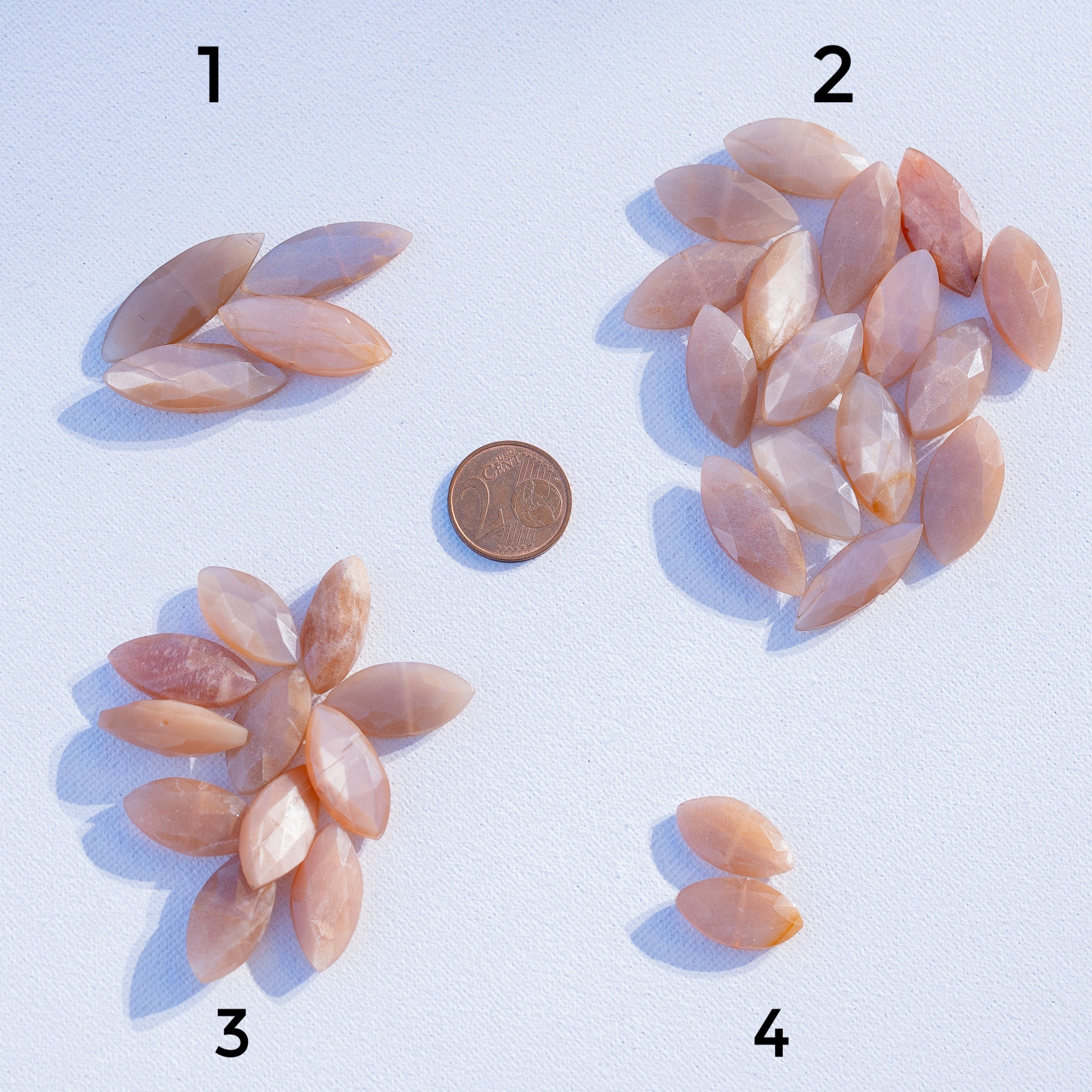 Perles ovoïdes facettes en Pierre de lune rose de env 17 à 30 mm ( à l&