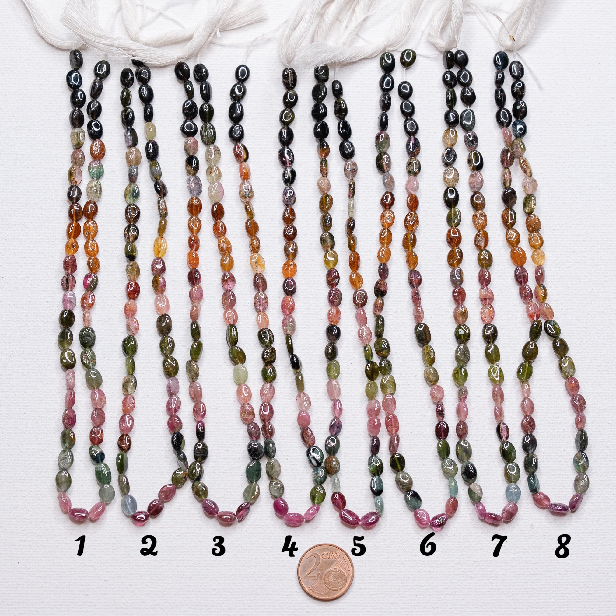 Rangs de 32 cm de perles ovales lisses de Tourmaline multicolore de env 5,5/7,5 mm